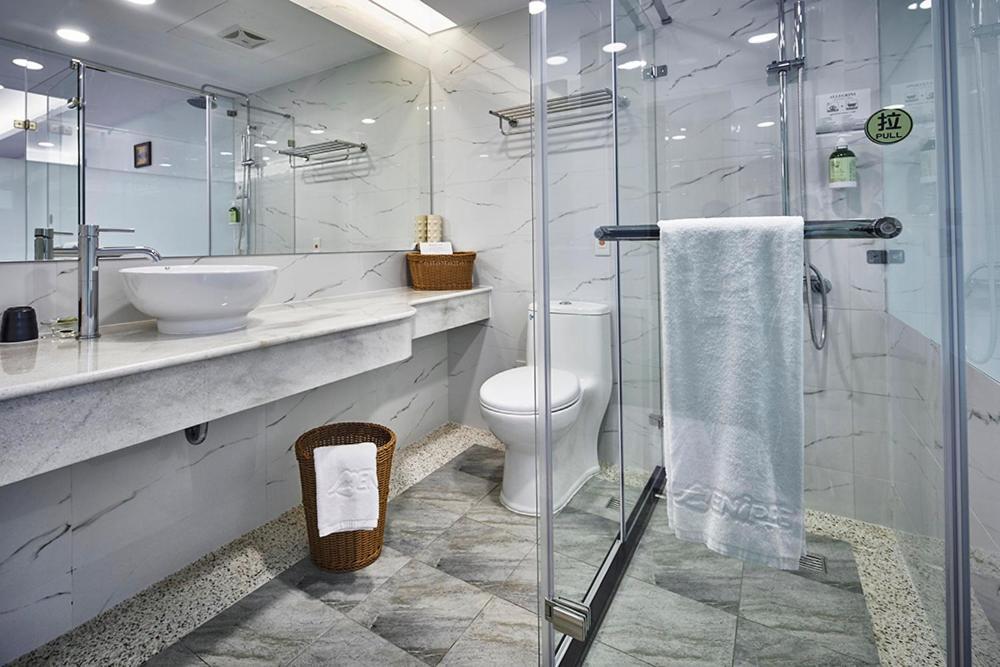 Menippe Hotel Kaohsiung Værelse billede